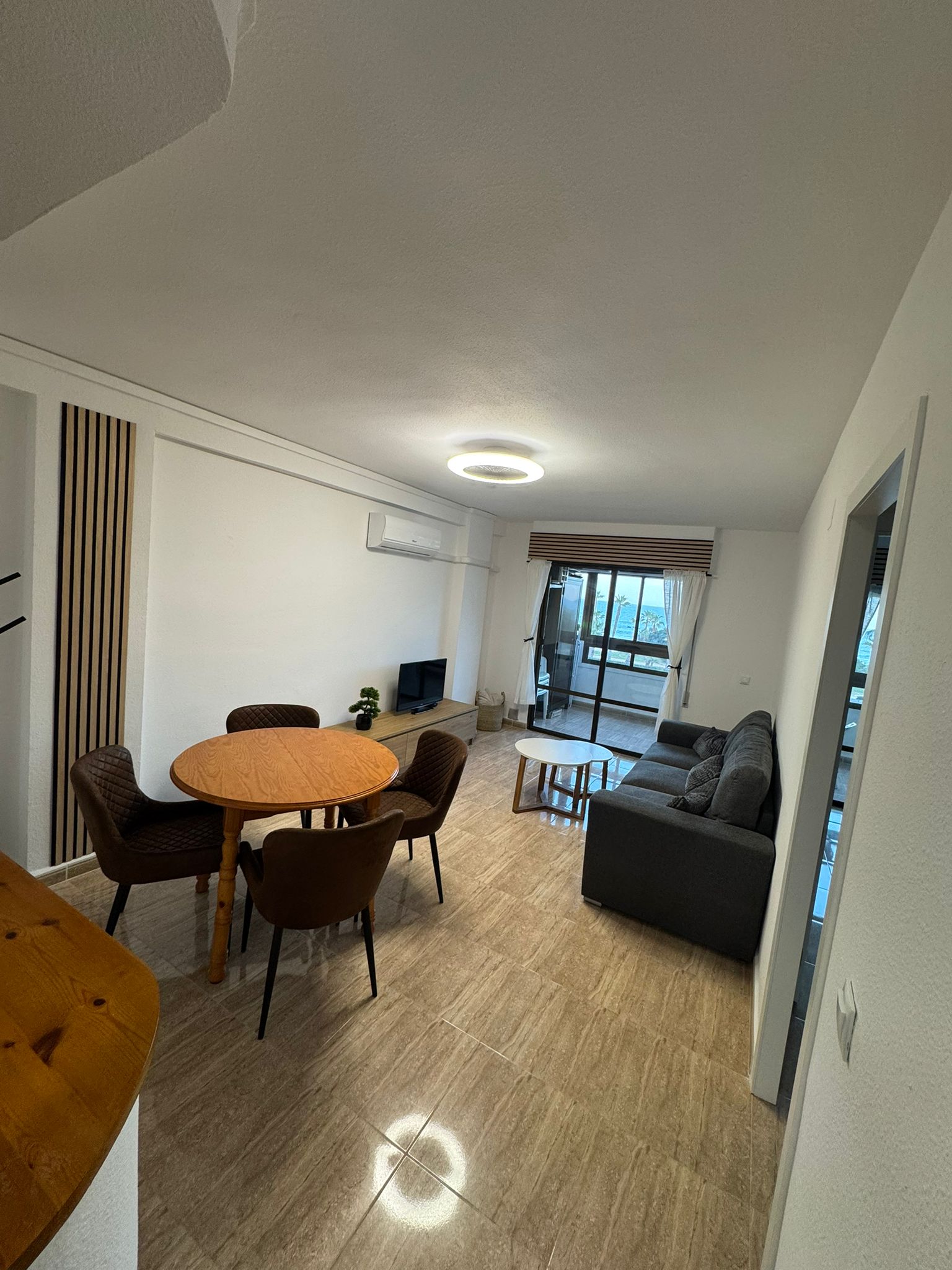 Obývací pokoj a jídelna apartmánu